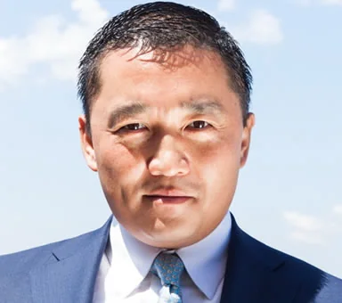 Benjamin Wey — portrait against open sky
