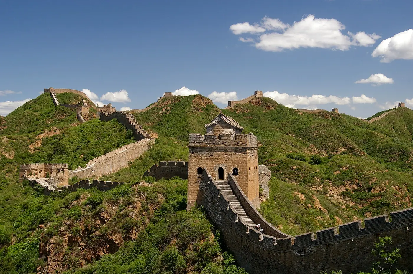The Great Wall winding through the green mountains of rural Hebei province, China